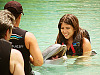 big-island-hawaii > Young girl interacting with the dolphin
