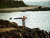 big-island-hawaii > Young woman swimmer at sunset