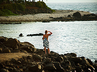 big-island-hawaii > Young woman swimmer at sunset