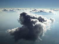 clouds-sky > Big Cloud Suspended in a Sea of Fog