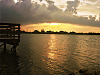 lake-pflugerville-sunset > Rocky beach near the pier at sunset