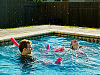 pflugerville-texas > Gabriel and Leandra having fun in swimming pool