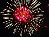 pflugerville-texas > Large fireworks explosion with pink center flower