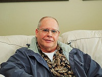 pflugerville-texas > Father on the couch at baby shower