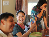 pflugerville-texas > Kim showing gifts at baby shower