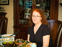 pflugerville-texas > Victoria sitting at the Thanksgiving dinner table