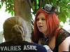 quakecon-dallas-2012 > Redhaired costumed fan girl with small hat at Quakecon 2012