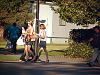 san-jose-state > Two blond girls in jean skirt being followed at SJSU